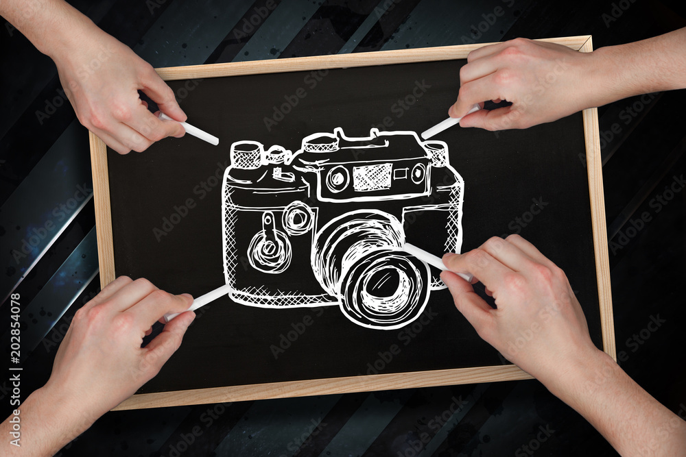 Poster composite image of multiple hands drawing camera with chalk against blackboard