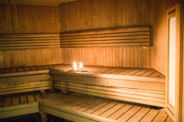 Fototapeta na wymiar Candles lighting in a sauna