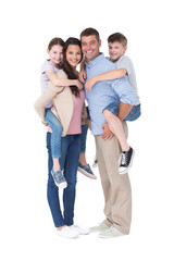 Obraz premium Parents giving piggyback ride to children over white background