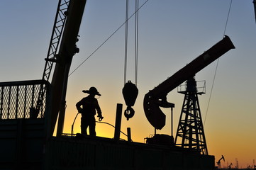 field oil workers at work
