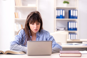 Young female student in educational concept