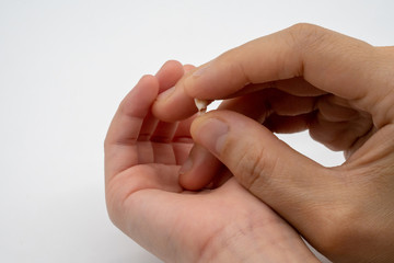 Kid and mother hands holding milk teeth. Childhood healthcare