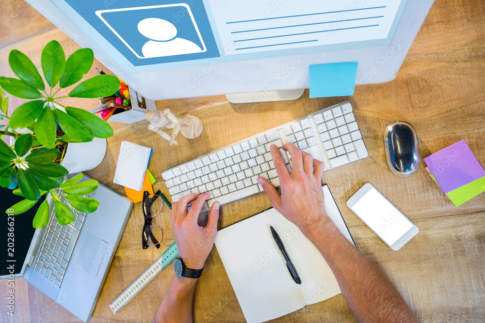 Aufkleber website interface against man working at his desk and typing on keyboard