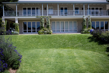 Fototapeta na wymiar Exterior of a house with lawn