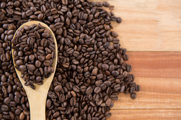 Roasted coffee beans with spoon