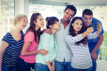 Creative business team taking a selfie