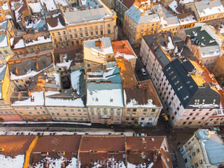 aerial view on narrowly streets of european city. evening time