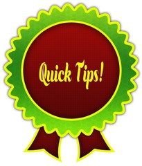 QUICK TIPS   on red and green round ribbon badge.