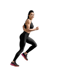 Obraz premium sideview of running athletic female. Smiling woman with fit, curvy body doing sport exercises. Model having slim, stunning figure, wearing sport trousers and top, also sneackers for professional run.