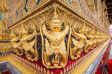 Fototapeta na wymiar Perspective view of golden Statue Garuda in wat phra kaew temple, Bangkok, Thailand.