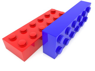 Two toy bricks in blue and red