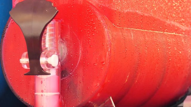 Red slush. Slush puppy machine. 