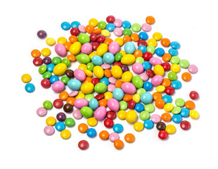 Obraz premium Colorful chocolate candy pills isolated