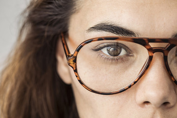 Close up of female eye with glasses