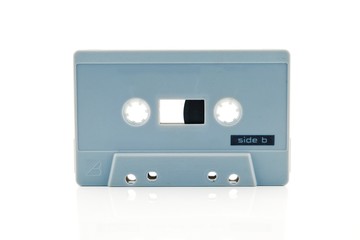 Gray cassette tape on white background.