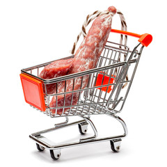Salami smoked sausage in shopping cart on white background