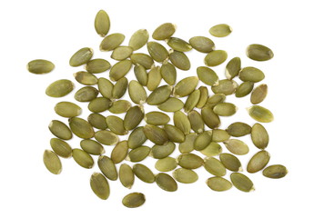 Pumpkin seeds isolated on white background, top view