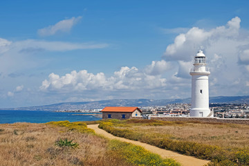 Fototapeta na wymiar Old lighthouse on the coast