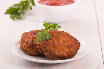 Meatballs on white dish. 