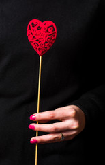 Woman holding a heart shape