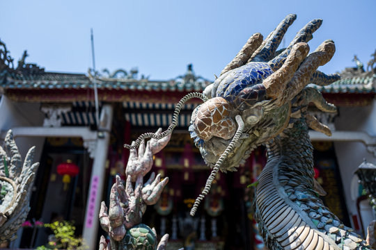 Dragon statue at temlle in Hoi An, Vietnam.