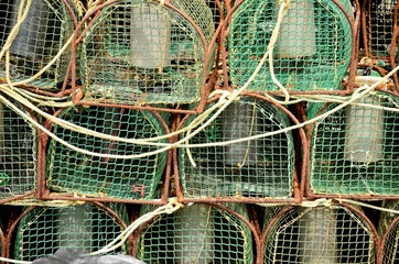 Pile of commercial fishing net with cords and floats as abstract background