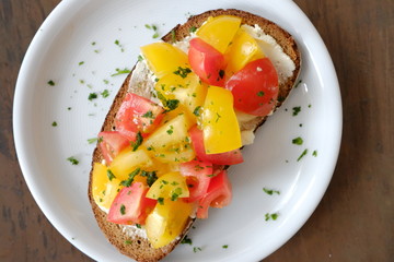 close-up of bread with fresh tomatoes served on plate 