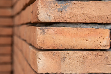 Close up orang old brick wall corner