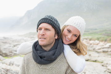 Romantic couple together on a rocky landscape