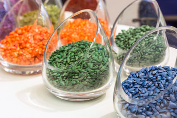 cans with sunflower seeds of different colors