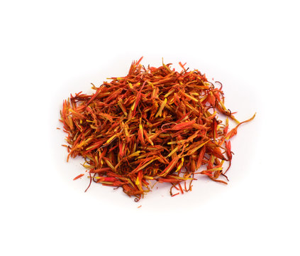 Spices of saffron flowers on white background