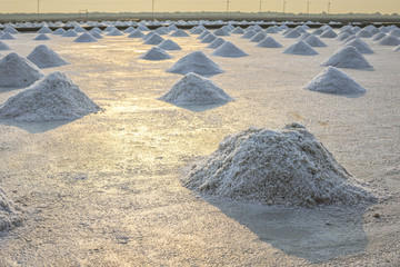 Salt piles in the Saline from Samutsakorn, Thailand. Salt Culture of Thailand It is made in the...