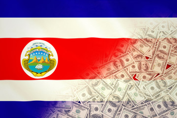 Pile of dollars against costa rica national flag