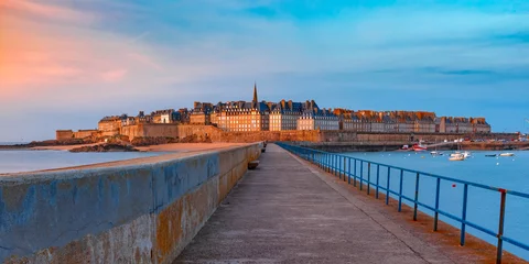 Fotobehang Panoramic view of walled city Saint-Malo with St Vincent Cathedral at sunset. Saint-Maol is famous port city of Privateers is known as city corsaire, Brittany, France © Kavalenkava