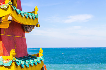 Red Hall of Taiwan On the hill Bright blue sea view. The sky has a faint white cloud.