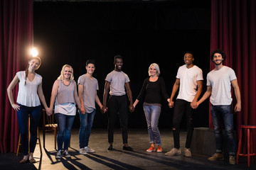 Actors practicing play on stage