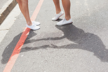 Couple standing on the road