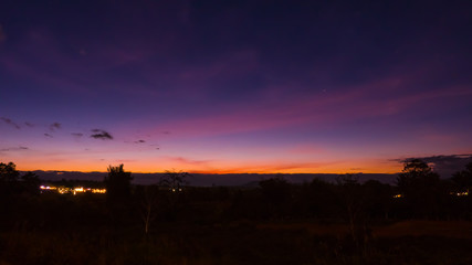 travel asia and summer concept from timelapse video sunset with cloud moving with firework with mountain view background