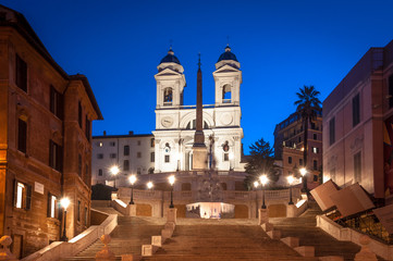 Fototapeta na wymiar Twilight walking in Rome, Scalinata di Trinita dei Monti church.