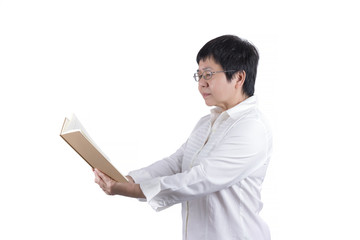 Asian Middle-aged woman in white shirt wearing eyeglasses reading a book isolated on white background , eyesight concept