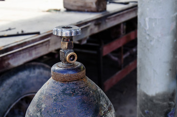 Fototapeta premium Crane on old gas cylinder
