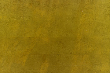 Yellow painted wall texture.