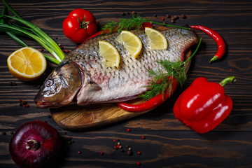 Carp fish with fresh vegetables