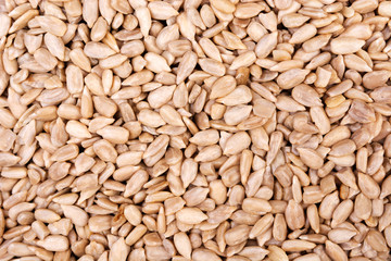 Peeled sunflower seeds background