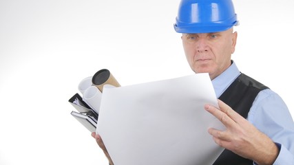 Confident Engineer Reading Techincal Plans on White Background