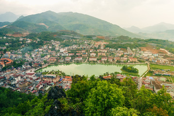 Fototapeta na wymiar Aerial view of landmark landscape at the hill town in Sapa city with the sunny light, Vietnam