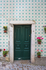 Fototapeta na wymiar doors of a historic house in the old town of Lisbon, Portugal