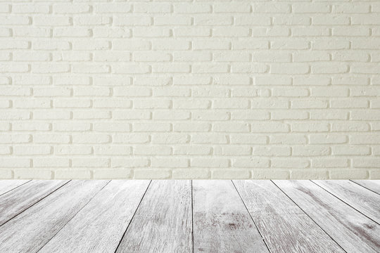 Empty wooden table with white brick wall background,product display template.