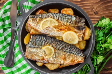 Gordijnen baked fish mackerel and potatoes. Selective focus.   © yanadjan
