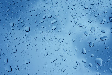 Water drops on clean surfaces. With the blue gradient, the concept of the background of the droplet.